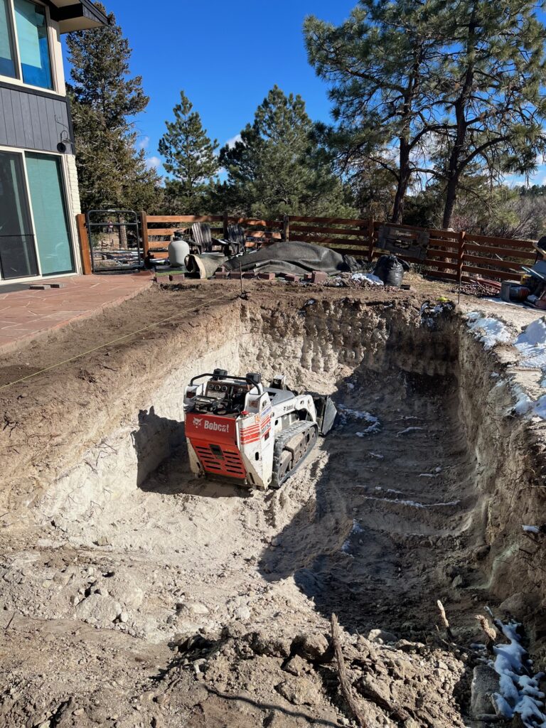 Excavating for a below ground container pool Denver CO