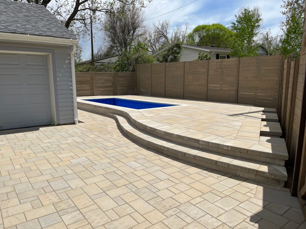 Container swimming pool and new paver pool deck Littleton CO