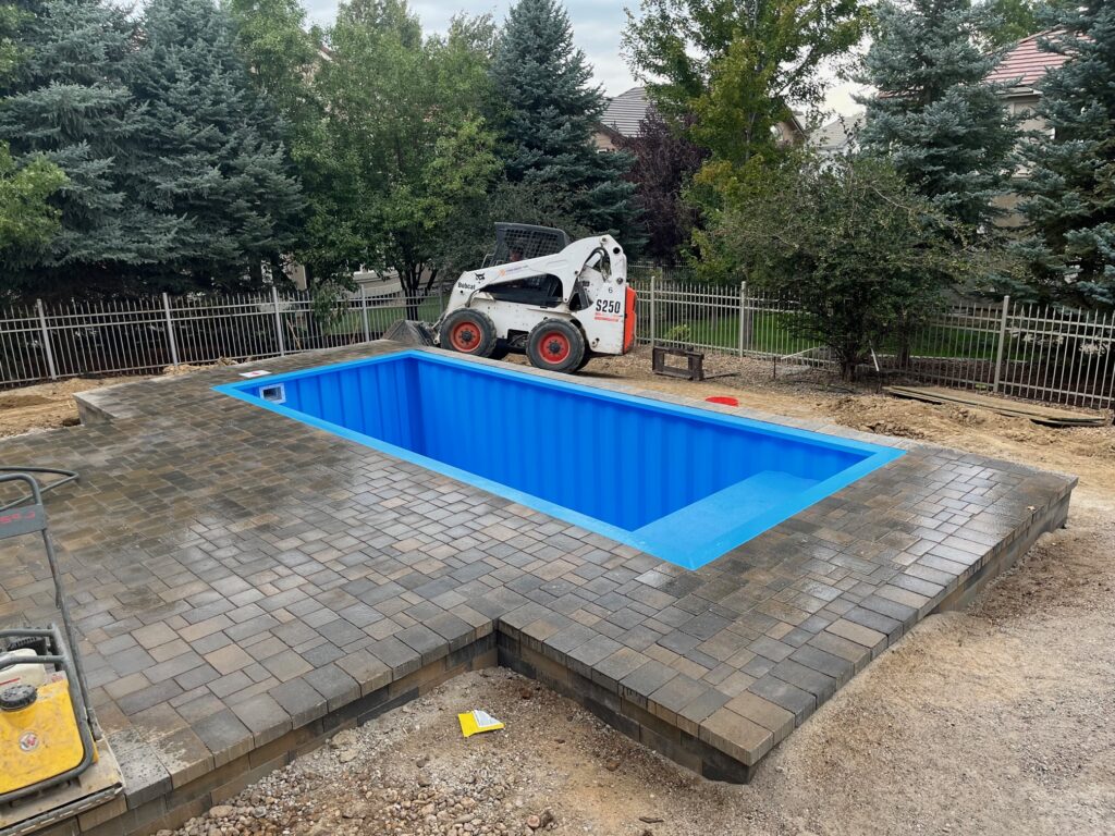 paver pool deck with new container pool denver co